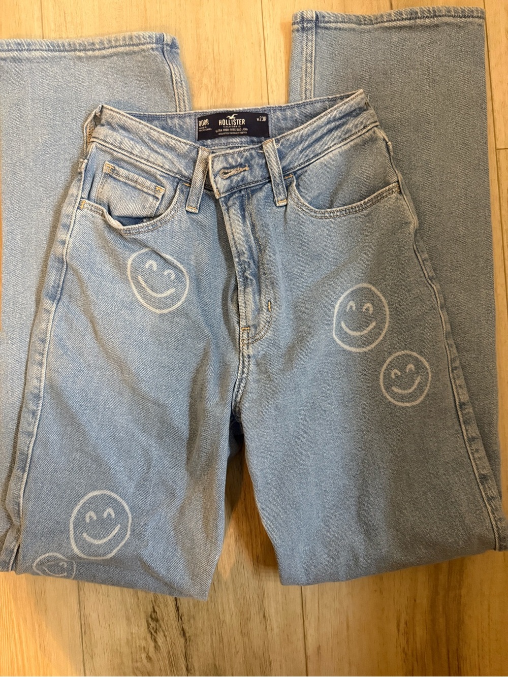 Hollister Light Blue Denim Jeans with Smiley Prints